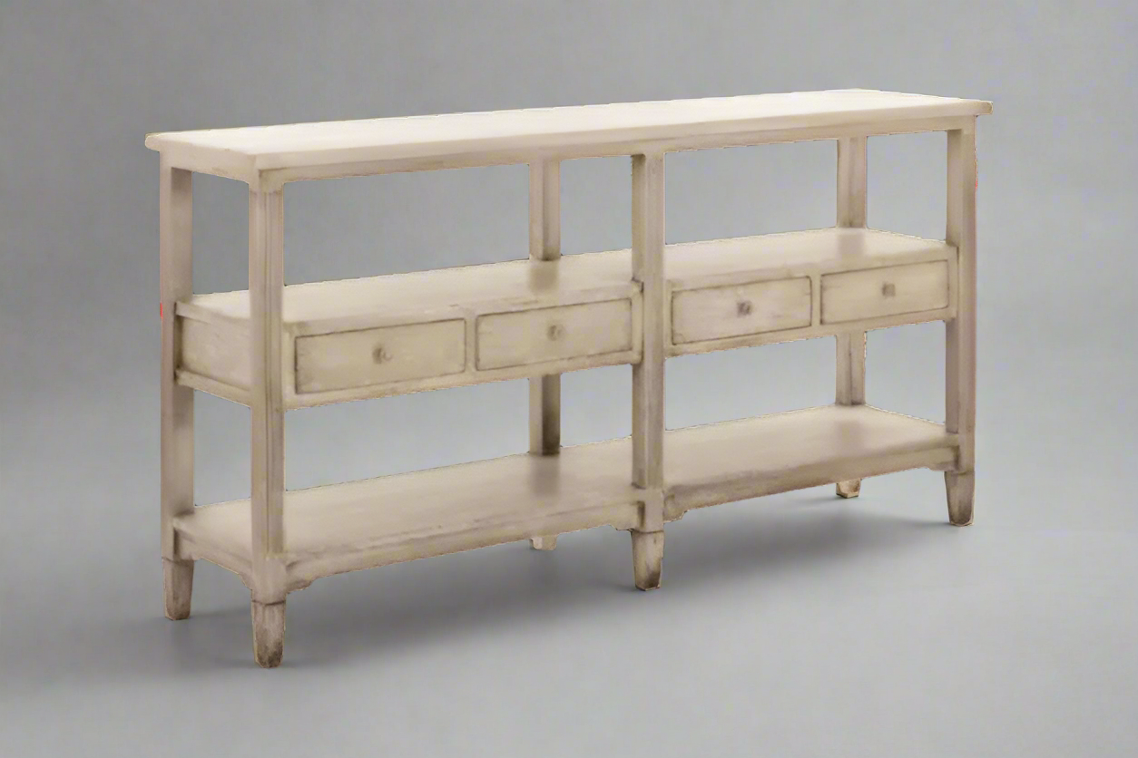 Wooden console table with drawers and shelves on a white background
