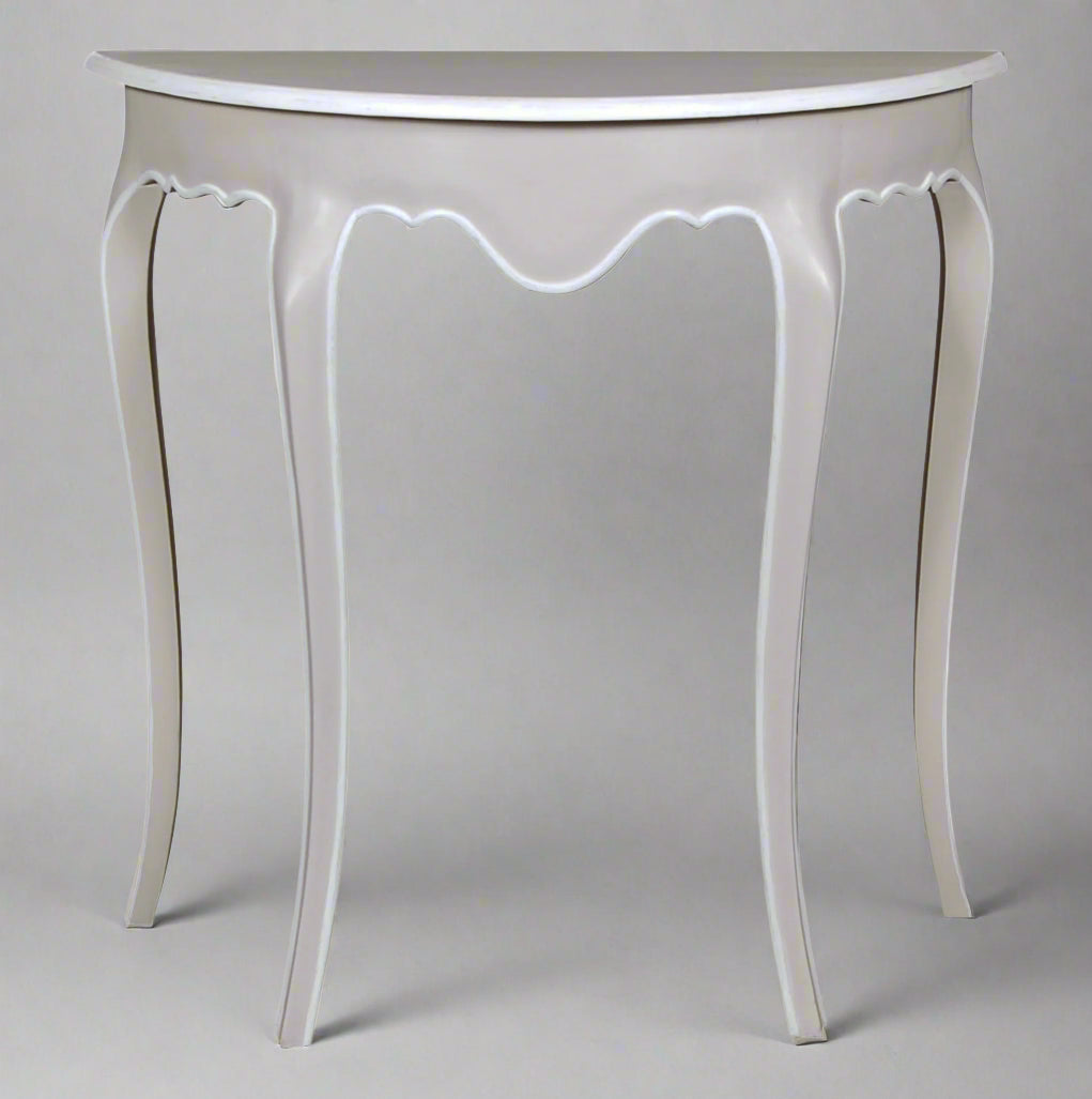 White decorative table with curved legs on a white background